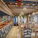 An artist rendering of Stitch’s Ohana Grill on the Disney Adventure, featuring Hawaiian and surfing decor